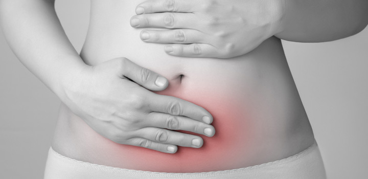woman with sore stomach endometriosis